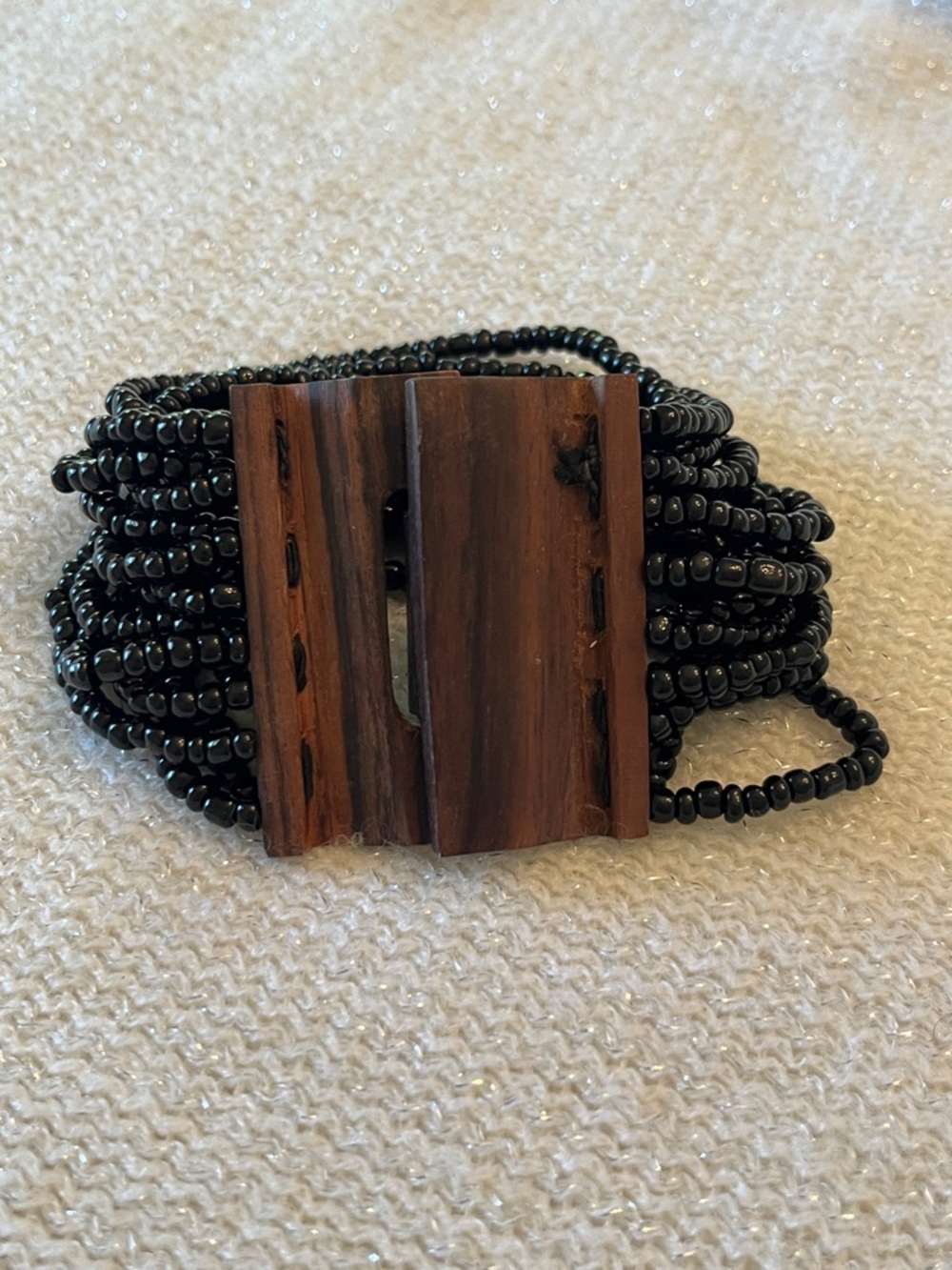 Multi-Strand Black Beaded Bracelet with Wood Slide Clasp
